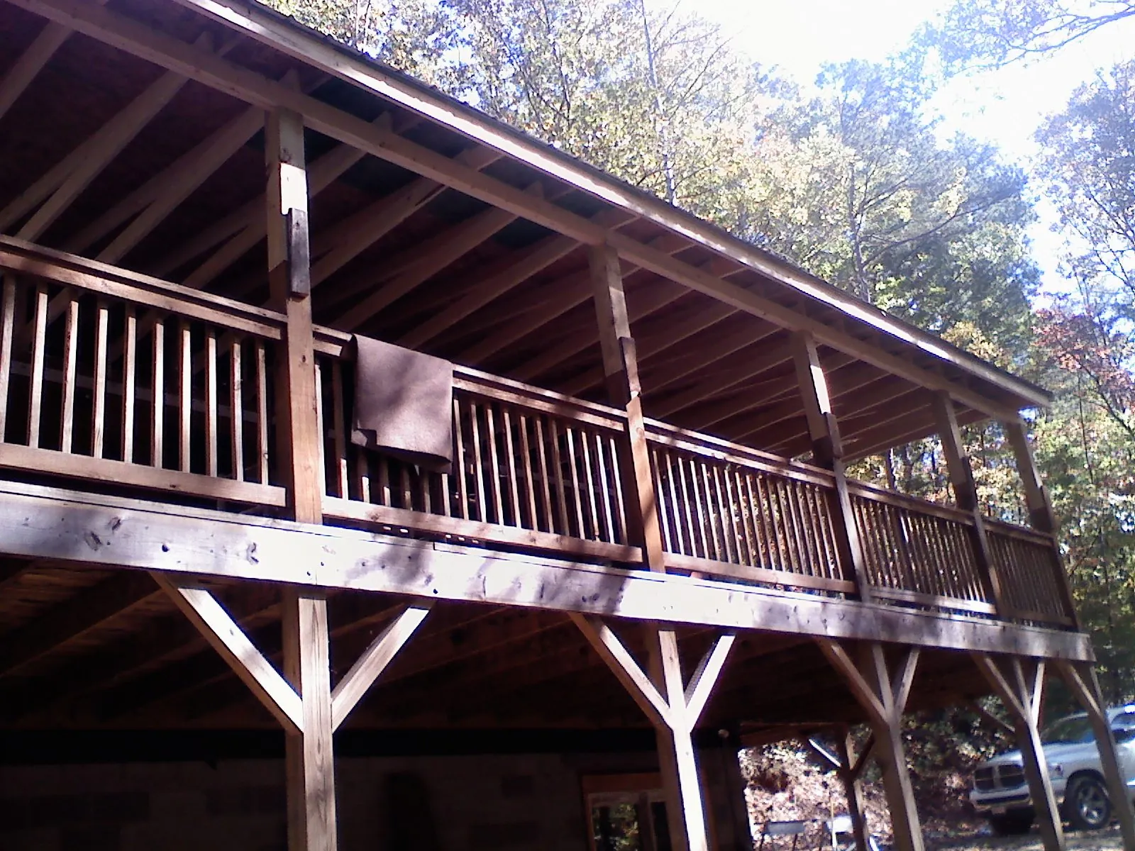Timber framing under a new elevated porch and deck — Roof Leak Repair in Bedford Hills by Roofing Brothers